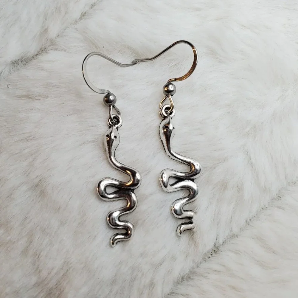 Simple snake charm earrings.